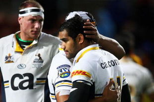 HAMILTON, NEW ZEALAND - MAY 15: Ben Hand (L) and Afusipa Taumoepeau of the Brumbies reflect after their loss in the round 14 Super 14 match between the Chiefs and the Brumbies at Waikato Stadium on May 15, 2009 in Hamilton, New Zealand.  (Photo by Sandra Mu/Getty Images)