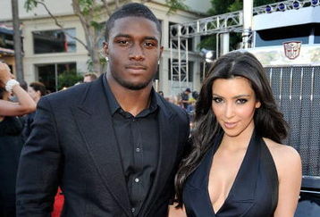 LOS ANGELES, CA - JUNE 22:  NFL player Reggie Bush (L) and TV personality Kim Kardashian arrive at the premiere of Dreamworks' 'Transformers: Revenge Of The Fallen' held at Mann Village Theatre on June 22, 2009 in Los Angeles, California.  (Photo by Kevin Winter/Getty Images)