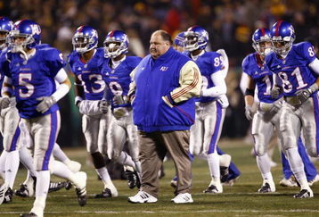 KANSAS CITY, MO - NOVEMBER 24: Coach Mark Mangino of the Kansas Jayhawks walks on the field with his team before the game against the Missouri Tigers at Arrowhead Stadium on November 24, 2007 in Kansas City, Missouri. (Photo by Jamie Squire/Getty Images) 