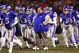 KANSAS CITY, MO - NOVEMBER 24: Coach Mark Mangino of the Kansas Jayhawks walks on the field with his team before the game against the Missouri Tigers at Arrowhead Stadium on November 24, 2007 in Kansas City, Missouri. (Photo by Jamie Squire/Getty Images) 