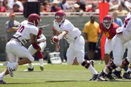 LOS ANGELES, CA - APRIL 25: Quarterback Matt Barkley #7 of the USC Trojans hands off the ball during the spring game on April 25, 2009 at the Los Angeles Memorial Coliseum in Los Angeles, California.  The cardinal team won 16-10.  (Photo by Jeff Golden/Getty Images)