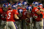 MIAMI - JANUARY 03:  Quarterback Todd Reesing #5 of the Kansas Jayhawks huddles with his team in the first quarter against the Virginia Tech Hokies during the FedEx Orange Bowl at Dolphin Stadium on January 3, 2008 in Miami, Florida.  (Photo by Marc Serota/Getty Images)