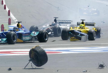 HOCKENHEIM, GERMANY - AUGUST 3:  Ralph Firman of Great Britain and Jordan collides with the remains of Kimi Raikkonen's accident during the Formula One German Grand Prix at Hockenheim on August 3, 2003 in Hockenheim, Germany. (Photo by Mark Thompson/Getty Images)