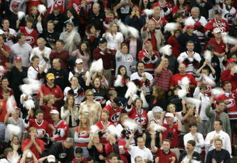 RALEIGH, NC - JUNE 14:  Fans of the Carolina Hurricanes cheer during game five of the 2006 NHL Stanley Cup Finals against the Edmonton Oilers on June 14, 2006 at the RBC Center in Raleigh, North Carolina.  (Photo by Bruce Bennett/Getty Images)