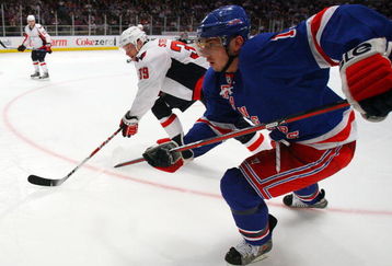 NEW YORK - APRIL 22:  Nikolai Zherdev #13 of the New York Rangers skates against David Steckel #39 of the Washington Capitals during Game Four of the Eastern Conference Quarterfinal Round of the 2009 NHL Stanley Cup Playoffs on April 22, 2008 at Madison Square Garden in New York City.  (Photo by Jim McIsaac/Getty Images)