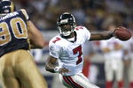 6 Jan 2002: Quarterback Michael Vick #7 of the Atlanta Falcons scrambles against the St. Louis Rams at the Dome at America's Center in St. Louis, Missouri. DIGITAL IMAGE. Mandatory Credit: Elsa /Getty Images