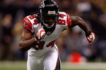 NEW ORLEANS - DECEMBER 07:  Roddy White #84 of the Atlanta Falcons runs downfield against the New Orleans Saints on December 7, 2008 at the Superdome in New Orleans, Louisiana.  (Photo by Chris Graythen/Getty Images)