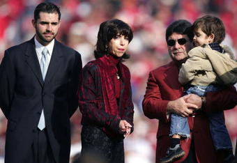SAN FRANCISCO - NOVEMBER 19:  (L-R) Jed York, Denise DeBartolo York and Eddie DeBartolo look on during a ceremony held in Jerry Rice's honor during half time of the NFL game between the San Francisco 49ers and the Seattle Seahawks at Monster Park on November 19, 2006 in San Francisco, California.  (Photo by Jed Jacobsohn/Getty Images)