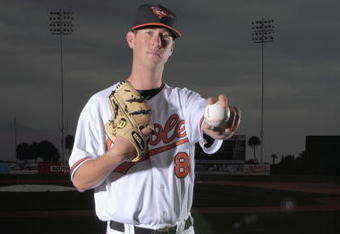 FORT LAUDERDALE, FL - FEBRUARY 23: Brian Matusz #86 of the Baltimore Orioles poses during photo day at the Orioles spring training complex on February 23, 2009 in Ft. Lauderdale, Florida. (Photo by Marc Serota/Getty Images)