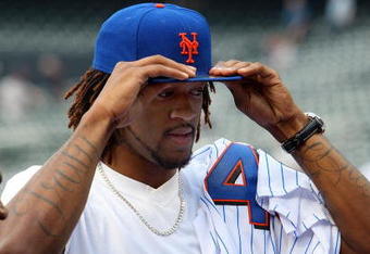 NEW YORK - JUNE 26:  New York Knicks 2009 first round draft pick Jordan Hill looks on as as the New York Mets take batting practice before playing the New York Yankees on June 26, 2009 at Citi Field in the Flushing neighborhood of the Queens borough of New York City.  (Photo by Jim McIsaac/Getty Images)