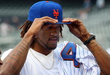 NEW YORK - JUNE 26:  New York Knicks 2009 first round draft pick Jordan Hill looks on as as the New York Mets take batting practice before playing the New York Yankees on June 26, 2009 at Citi Field in the Flushing neighborhood of the Queens borough of New York City.  (Photo by Jim McIsaac/Getty Images)