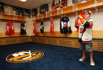 UNIONDALE, NY - JUNE 26:  Matthew Arena of Glen Cove takes a tour of the Islanders looker room during the New York Islanders Draft Party on June 26, 2009 at Nassau Coliseum in Uniondale, New York.  (Photo by Mike Stobe/Getty Images)