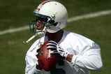 DAVIE, FL - MAY 02:  Rookie quarterback Pat White  #6 of the Miami Dolphins drops back to pass during mini camp on May 2, 2009 at the Miami Dolphins Training facility in Davie, Florida.  (Photo by Marc Serota/Getty Images)