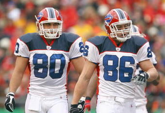 KANSAS CITY, MO - NOVEMBER 23:  Derek Schouman #80 and Derek Fine #86 of the Buffalo Bills walk on the field during the game against the Kansas City Chiefs on November 23, 2008 at Arrowhead Stadium in Kansas City, Missouri. (Photo by Jamie Squire/Getty Images)