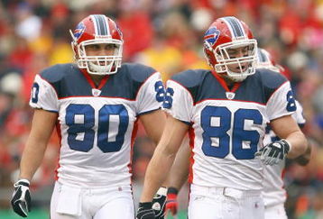 KANSAS CITY, MO - NOVEMBER 23:  Derek Schouman #80 and Derek Fine #86 of the Buffalo Bills walk on the field during the game against the Kansas City Chiefs on November 23, 2008 at Arrowhead Stadium in Kansas City, Missouri. (Photo by Jamie Squire/Getty Images)