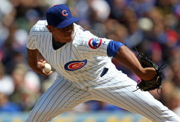 CHICAGO - MAY 16: Carlos Marmol #49 of the Chicago Cubs throws the ball against the Houston Astros on May 16, 2009 at Wrigley Field in Chicago, Illinois. The Cubs defeated the Astros 5-4. (Photo by Jonathan Daniel/Getty Images)