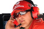 VALENCIA, SPAIN - AUGUST 23:  Technical adviser for Ferrari Michael Schumacher sits in the garage during qualifying for the European Formula One Grand Prix at the Valencia Street Circuit on August 23, 2008, in Valencia, Spain.  (Photo by Jasper Juinen/Getty Images)