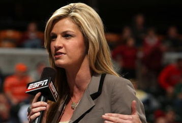 INDIANAPOLIS - MARCH 12:  ESPN's Erin Andrews performs an on camera report as the Michigan Wolveriens play against the Iowa Hawkeyes during the first round of the Big Ten Men's Basketball Tournament at Conseco Fieldhouse on March 12, 2009 in Indianapolis, Indiana.  (Photo by Jonathan Daniel/Getty Images)