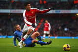 LONDON - DECEMBER 28:  Carlos Vela (R) of Arsenal holds off the challenge of Sean Davis (L) of Portsmouth during the Barclays Premier League match between Arsenal and Portsmouth at the Emirates Stadium on December 28, 2008 in London, England.  (Photo by Jamie McDonald/Getty Images)