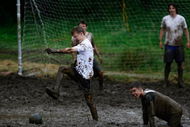 DUNOON, UNITED KINGDOM - JUNE 16:  Players take part in the annual UK Swamp Soccer tournament on June 16, 2007 in Dunoon, Scotland .Swamp Soccer originates from the swamps of Finland and is fast becoming an alternative sport with tournaments taking place all over the World. (Photo by Jeff J Mitchell/Getty Images)