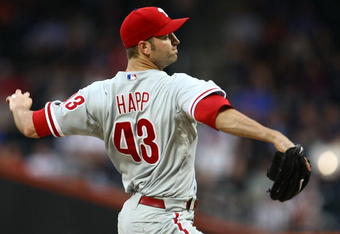 NEW YORK - JUNE 09:  J.A. Happ #43 of the Philadelphia Phillies pitches against the  New York Mets  during their game at Citi Field on June 9, 2009 in the Flushing neighborhood of the Queens borough of New York City.  (Photo by Chris McGrath/Getty Images)