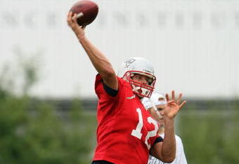 FOXBORO, MA - JULY 31:  Quarterback Tom Brady #12 of the New England Patriots passes the ball during training camp on July 31, 2009 at Gillette Stadium in Foxboro, Massachusetts.  (Photo by Elsa/Getty Images)