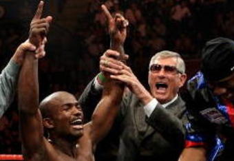 NOTTINGHAM, ENGLAND - MAY 10:  Timothy Bradley celebrates his win against Junior Witter for the WBC Light Welterweight fight on May 10, 2008 at Nottingham Ice Arena in Nottingham, England. (Photo by John Gichigi/Getty Images)