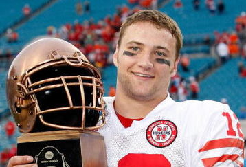 JACKSONVILLE, FL - JANUARY 1:  Quarterback Joe Ganz #12 of the Nebraska Cornhuskers holds the MVP trophy following the Konica Minolta Gator Bowl against the Clemson Tigers at Jacksonville Municipal Stadium January 1, 2009 in Jacksonville, Florida.  (Photo by Sam Greenwood/Getty Images)