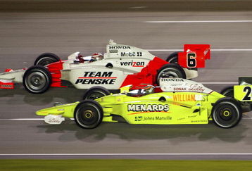 SPARTA, KY - AUGUST 01:  Ryan Briscoe, driver of the #6 Team Penske Dallara Honda, celebrates after crossing the finish line after winning ahead of Ed Carpenter, driver of the #20 Vision Racing Dallara Honda, during the IRL IndyCar Series Meijer Indy 300 on August 1, 2009 at the Kentucky Speedway in Sparta, Kentucky.  (Photo by Robert Laberge/Getty Images)