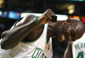 BOSTON - NOVEMBER 10:  Kevin Garnett #5 of the Boston Celtics celebrates in the fourth quarter against the Toronto Raptors on November 10,  2008 at TD Banknorth Garden in Boston, Massachusetts. The Celtics defeated the Toronto Raptors 94-87.  (Photo by Elsa/Getty Images)