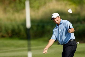 CARMEL, IN - AUGUST 02:  Fred Funk of the USA hits his third shot on the 13th hole during the 2009 U.S. Senior Open on August 2, 2009 at Crooked Stick Golf Club in Carmel, Indiana.  (Photo by Jamie Squire/Getty Images)