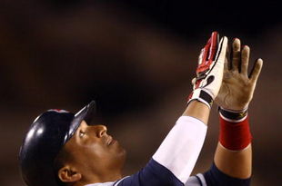 ANAHEIM, CA - JULY 27:  Victor Martinez #41 of the Cleveland Indians celebrates after hitting a three-run home run in the ninth inning against the Los Angeles Angels of Anaheim at Angel Stadium on July 27, 2009 in Anaheim, California. The Indians defeated the Angels 8-6.  (Photo by Jeff Gross/Getty Images)