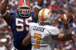 GAINSVILLE, FL - SEPTEMBER 20:  Linebacker Channing Crowder #55 of the University of Florida Gators deflects a pass by quarterback Casey Clausen #7 of the University of Tennessee Volunteers during the game at Ben Hill Griffin Stadium on September 20, 2003 in Gainesville, Florida.  Tennessee defeated Florida 24-10.  (Photo by Matt Stroshane/Getty Images)   