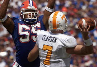 GAINSVILLE, FL - SEPTEMBER 20:  Linebacker Channing Crowder #55 of the University of Florida Gators deflects a pass by quarterback Casey Clausen #7 of the University of Tennessee Volunteers during the game at Ben Hill Griffin Stadium on September 20, 2003 in Gainesville, Florida.  Tennessee defeated Florida 24-10.  (Photo by Matt Stroshane/Getty Images)   