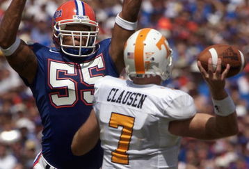 GAINSVILLE, FL - SEPTEMBER 20:  Linebacker Channing Crowder #55 of the University of Florida Gators deflects a pass by quarterback Casey Clausen #7 of the University of Tennessee Volunteers during the game at Ben Hill Griffin Stadium on September 20, 2003 in Gainesville, Florida.  Tennessee defeated Florida 24-10.  (Photo by Matt Stroshane/Getty Images)   