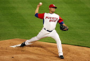MIAMI - MARCH 16: Ian Snell #45 of Puerto Rico pitches against Venezuela during day 3 of round 2 of the World Baseball Classic at Dolphin Stadium on March 16, 2009 in Miami, Florida.  (Photo by Doug Benc/Getty Images)