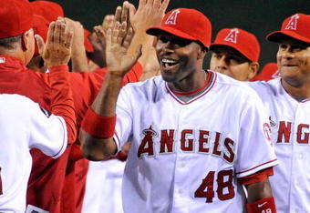 ANAHEIM, CA - APRIL 06:  Torii Hunter #48 of the Los Angeles Angels and Bobby Abreu #53 celebrate after shutting out the Oakland Athletics, during their Opening Day game at Angel Stadium on April 6, 2009 in Anaheim, California.  The Angels won, 3-0.  (Photo by Kevork Djansezian/Getty Images)