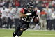 ATLANTA - DECEMBER 14: Running back Michael Turner #33 of the Atlanta Falcons rushes upfield against the Tampa Bay Buccaneers at the Georgia Dome on December 14, 2008 in Atlanta, Georgia. (Photo by Al Messerschmidt/Getty Images)