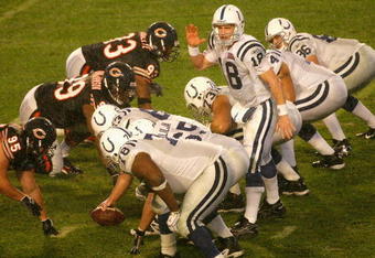 MIAMI GARDENS, FL - FEBRUARY 04:  Quarterback Peyton Manning #18 of the Indianapolis Colts prepares to snap the ball against the Chicago Bears during Super Bowl XLI on February 4, 2007 at Dolphin Stadium in Miami Gardens, Florida. The Colts won 29-17.  (Photo by Eliot J. Schechter/Getty Images)