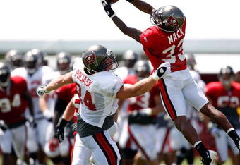 TAMPA - AUGUST 01:  Cornerback Elbert Mack #33 of the Tampa Bay Buccaneers intercepts a pass during Training Camp at One Buccaneer Place on August 1, 2009 in Tampa, Florida.  (Photo by J. Meric/Getty Images)