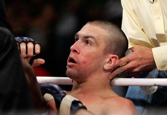 HOFFMAN ESTATES, IL - MAY 19:  Josh Neer of the Silverbacks lies on the canvas after being knocked out by Mark Miller of the Red Bears on May 19, 2007 at the Sears Centre in Chicago, Illinois.  (Photo by Brian Bahr/Getty Images for IFL)