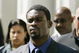 RICHMOND, VA - JULY 26:  Escorted by U.S. marshals, Atlanta Falcons quarterback Michael Vick leaves the federal courthouse following his arraignment July 26, 2007 in Richmond, Virginia. Vick and three associates were indicted earlier this month on charges related to their alleged role in an interstate dogfighting ring.  (Photo by Haraz N. Ghanbari-Pool/Getty Images)