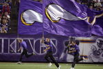 MINNEAPOLIS - AUGUST 25:  Flag runners of the Minnesota Vikings run up field against the Baltimore Ravens on August 25, 2006 at the H.H.H. Metrodome in Minneapolis, Minnesota. (Photo by David Sherman/Getty Images)