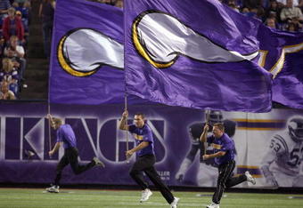 MINNEAPOLIS - AUGUST 25:  Flag runners of the Minnesota Vikings run up field against the Baltimore Ravens on August 25, 2006 at the H.H.H. Metrodome in Minneapolis, Minnesota. (Photo by David Sherman/Getty Images)