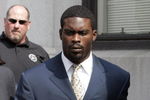 RICHMOND, VA - AUGUST 27:  Atlanta Falcons quarterback Michael Vick (R) leaves federal court August 27, 2007 in Richmond, Viriginia. Vick pleaded guilty to a federal dogfighting charge.  (Photo by Steve Helber-Pool/Getty Images)