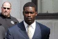 RICHMOND, VA - AUGUST 27: Atlanta Falcons quarterback Michael Vick (R) leaves federal court August 27, 2007 in Richmond, Viriginia. Vick pleaded guilty to a federal dogfighting charge. (Photo by Steve Helber-Pool/Getty Images)