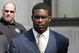RICHMOND, VA - AUGUST 27:  Atlanta Falcons quarterback Michael Vick (R) leaves federal court August 27, 2007 in Richmond, Viriginia. Vick pleaded guilty to a federal dogfighting charge.  (Photo by Steve Helber-Pool/Getty Images)
