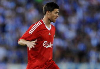 BARCELONA, SPAIN - AUGUST 02:  Xabi Alonso of Liverpool controls the ball during the pre-season friendly match between Espanyol and Liverpool at the Nuevo Estadio de Cornella-El Prat on August 2, 2009 in Barcelona, Spain. Espanyol won the match 3-0.  (Photo by Jasper Juinen/Getty Images)