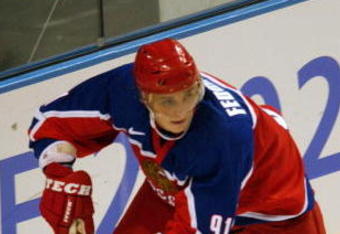 15 Feb 2002:  Sergei Fedorov of Russia carries the puck agains Belarus during the Salt Lake City Winter Olympic Games at the E Center in Salt Lake City, Utah. DIGITAL IMAGE.Mandatory Credit:  Doug Pensinger/Getty Images