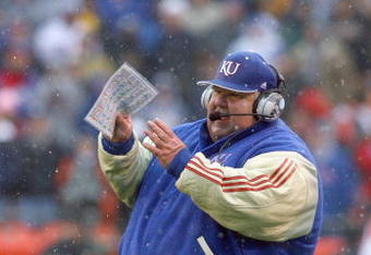KANSAS CITY, MO - NOVEMBER 29:  Head coach Mark Mangino of the Kansas Jayhawks watches the action during the game against the Missouri Tigers on November 29, 2008 at Arrowhead Stadium in Kansas City, Missouri. (Photo by Jamie Squire/Getty Images)